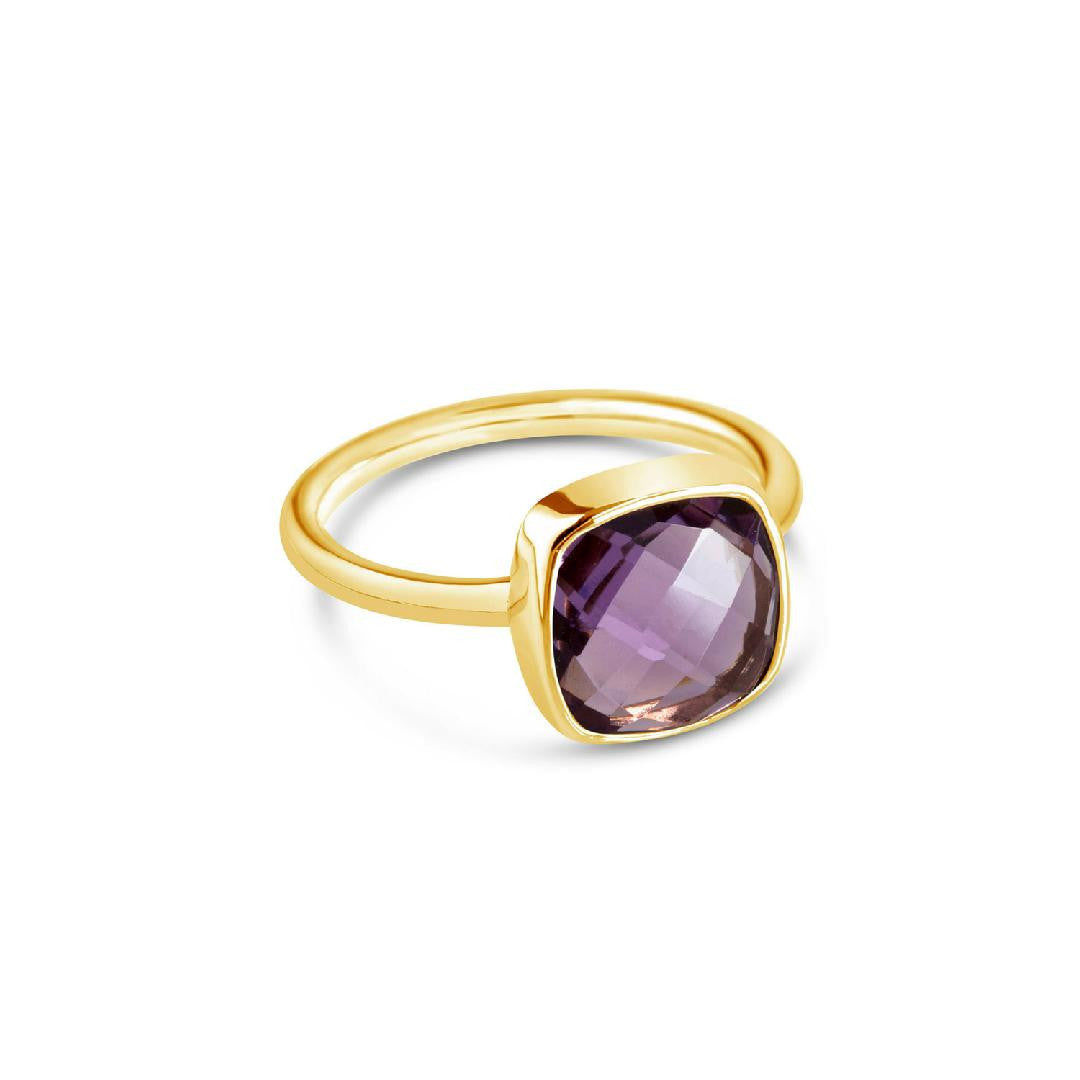 purple amethyst cocktail ring in gold on a white background 