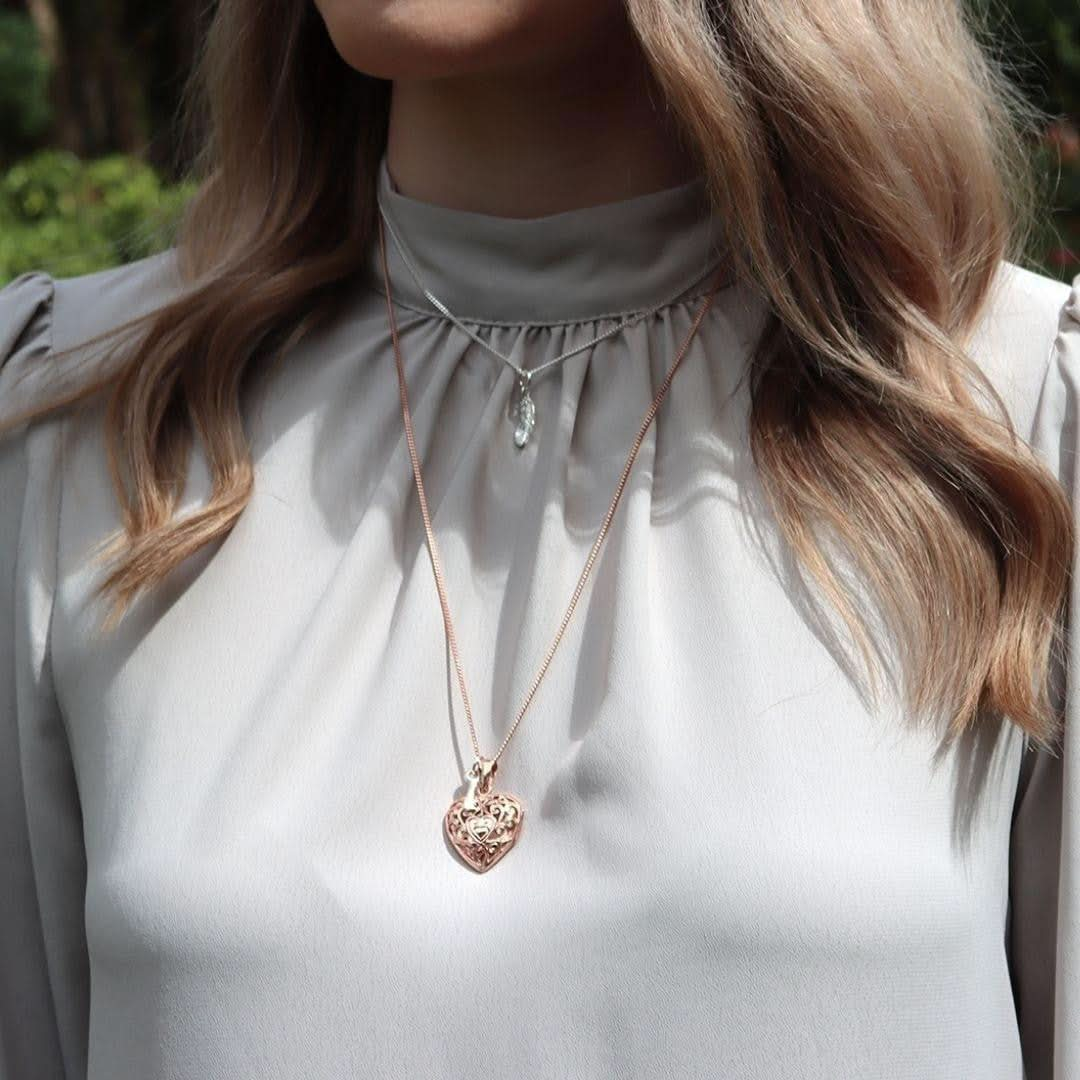 model wearing key locket in rose gold