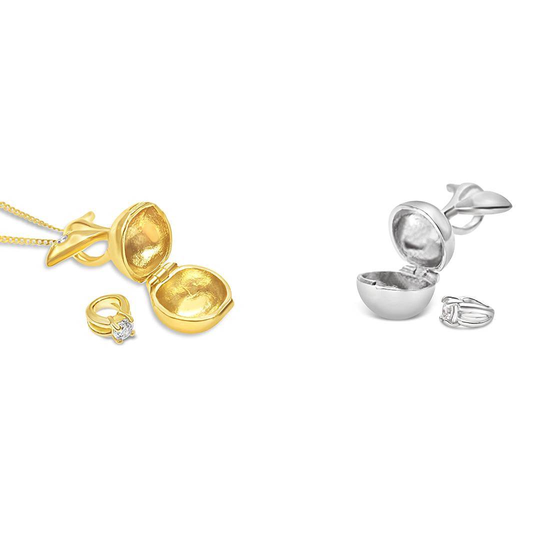 two apple magical charms in gold and silver