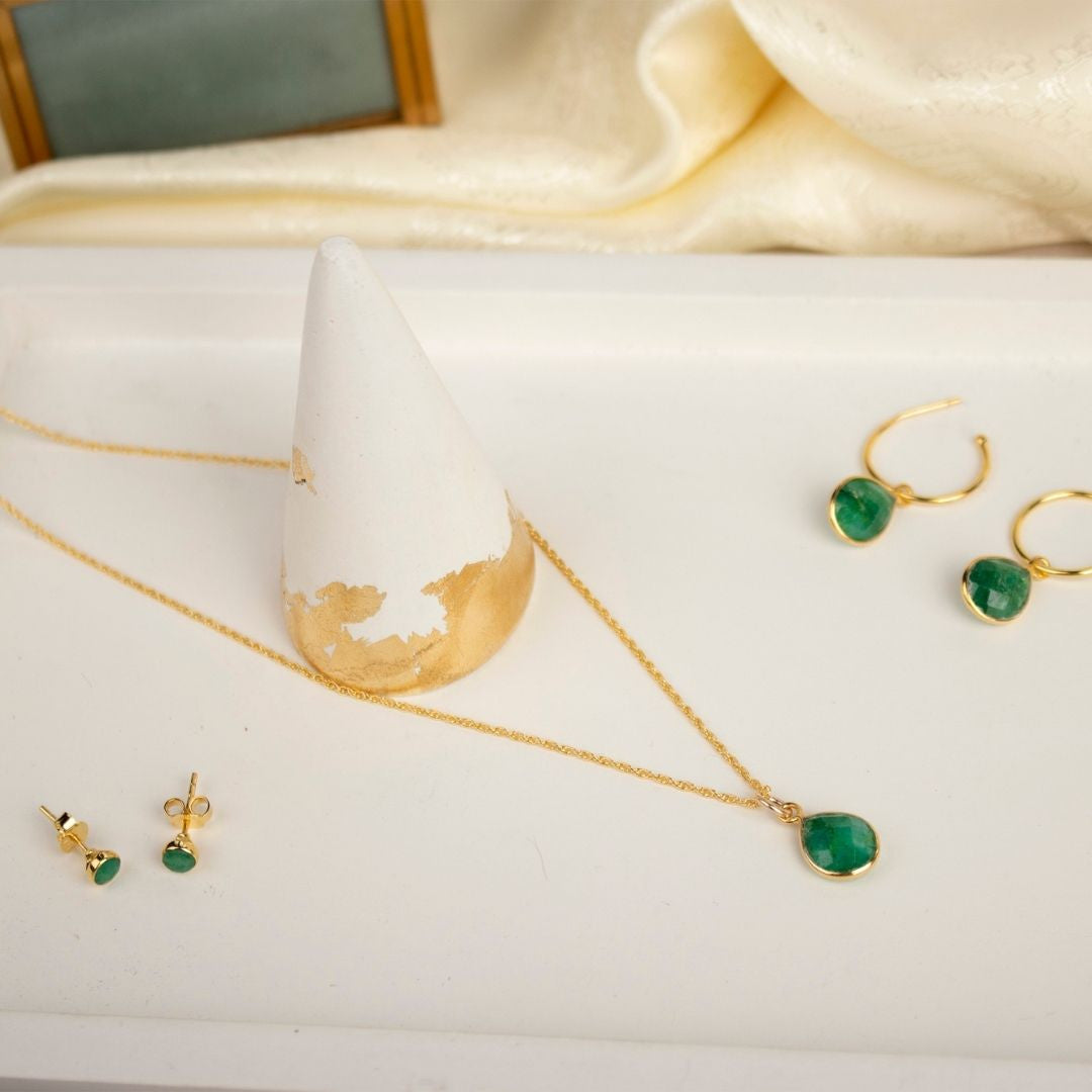 Lily Blanche mini stud earrings hoop earrings and necklace with emerald gemstones