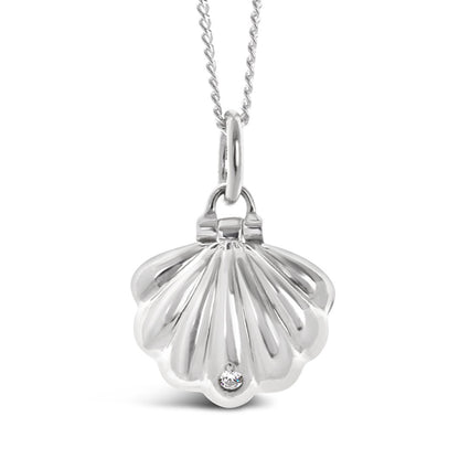 magical shell charm necklace in silver on a white background