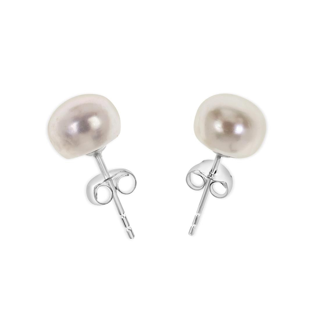 classic pearl earrings in ivory on a white background