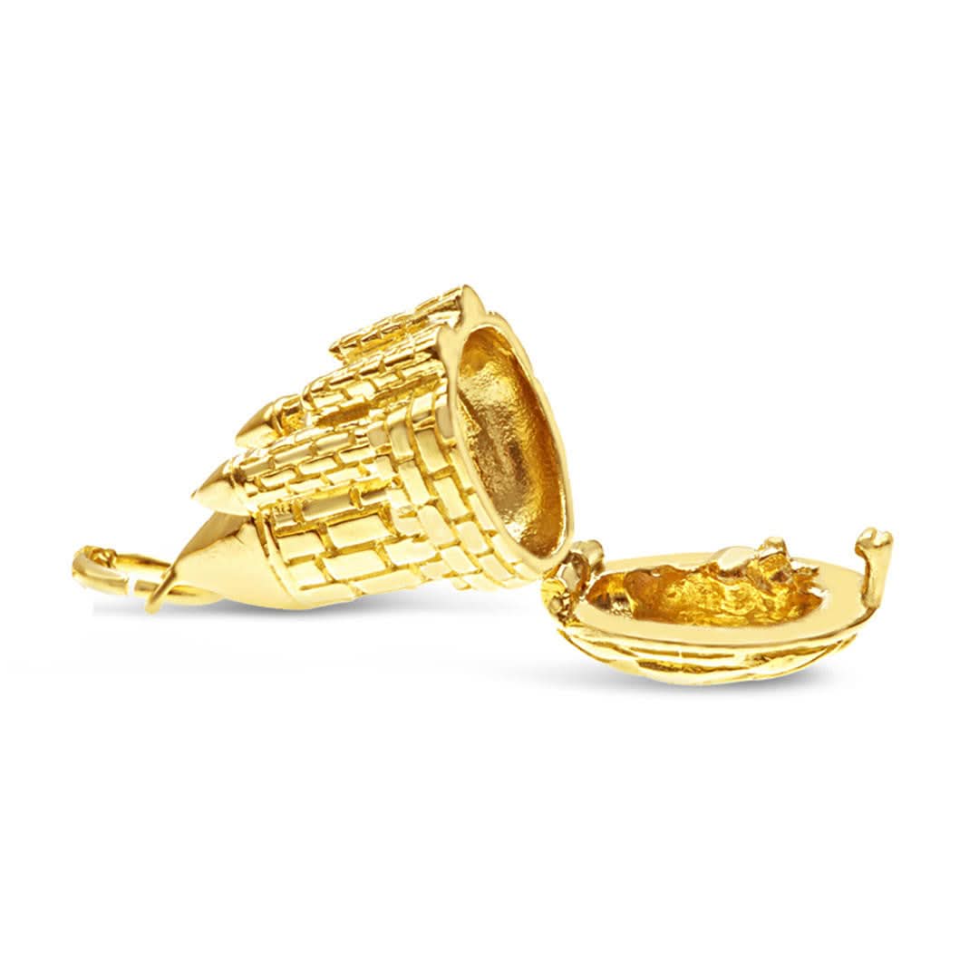 inside magical gold castle charm