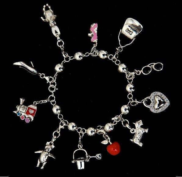 lucky charm bracelet with multiple charms attached