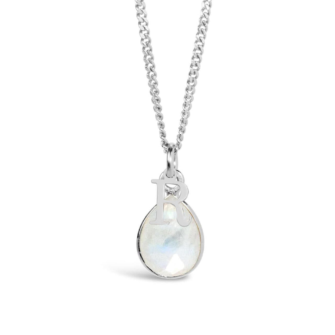 white quartz charm necklace in silver on a white background