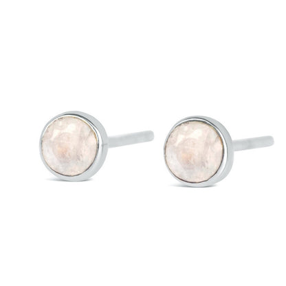 Silver moonstone stud earrings on a white background