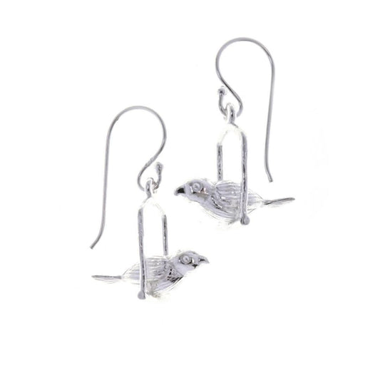 love bird earrings on a white background