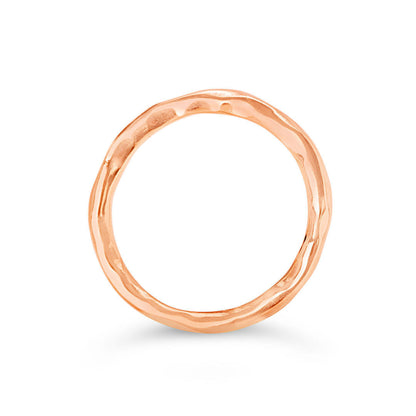 rose gold friendship band ring on a white background