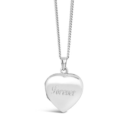 engraved secret silver heart locket on a white background