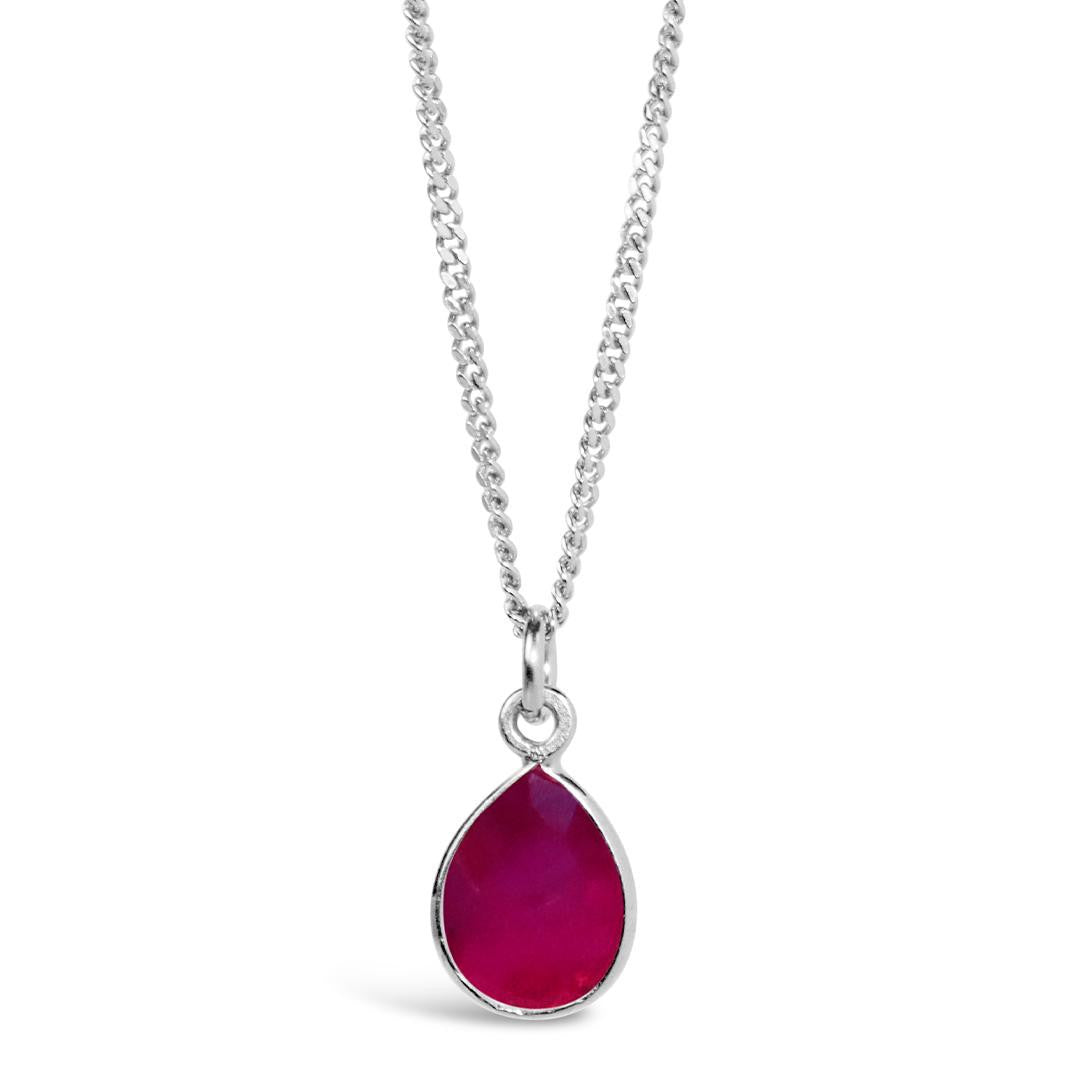 ruby charm necklace in silver on a white background