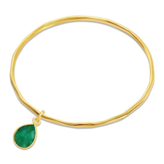 Thin gold bangle with tear drop emerald