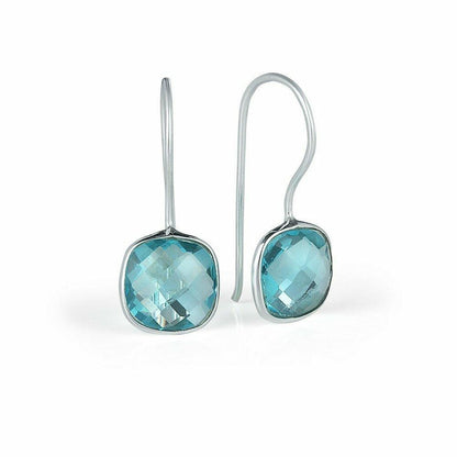 blue topaz earrings in silver on a white background