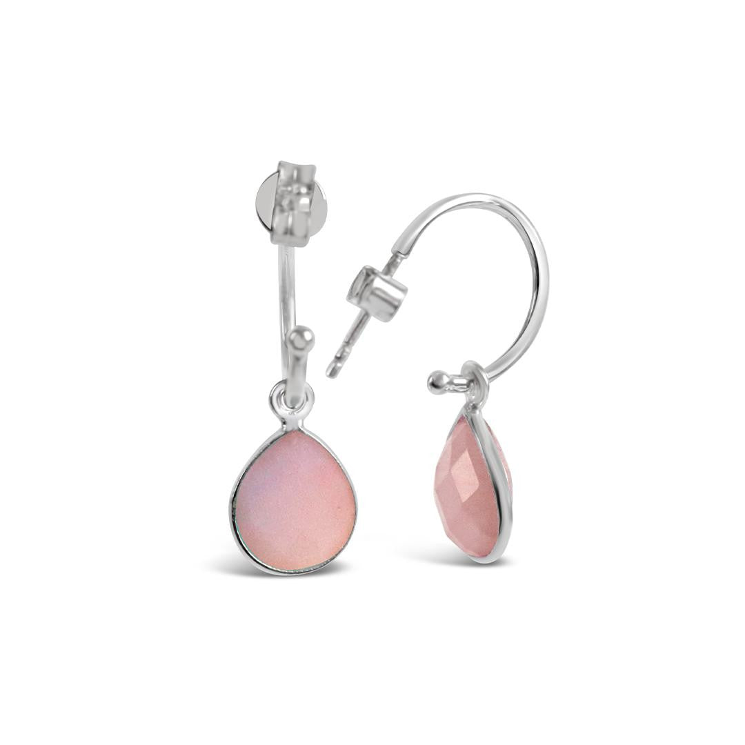 pink opal drop hoop earrings in silver on a white background