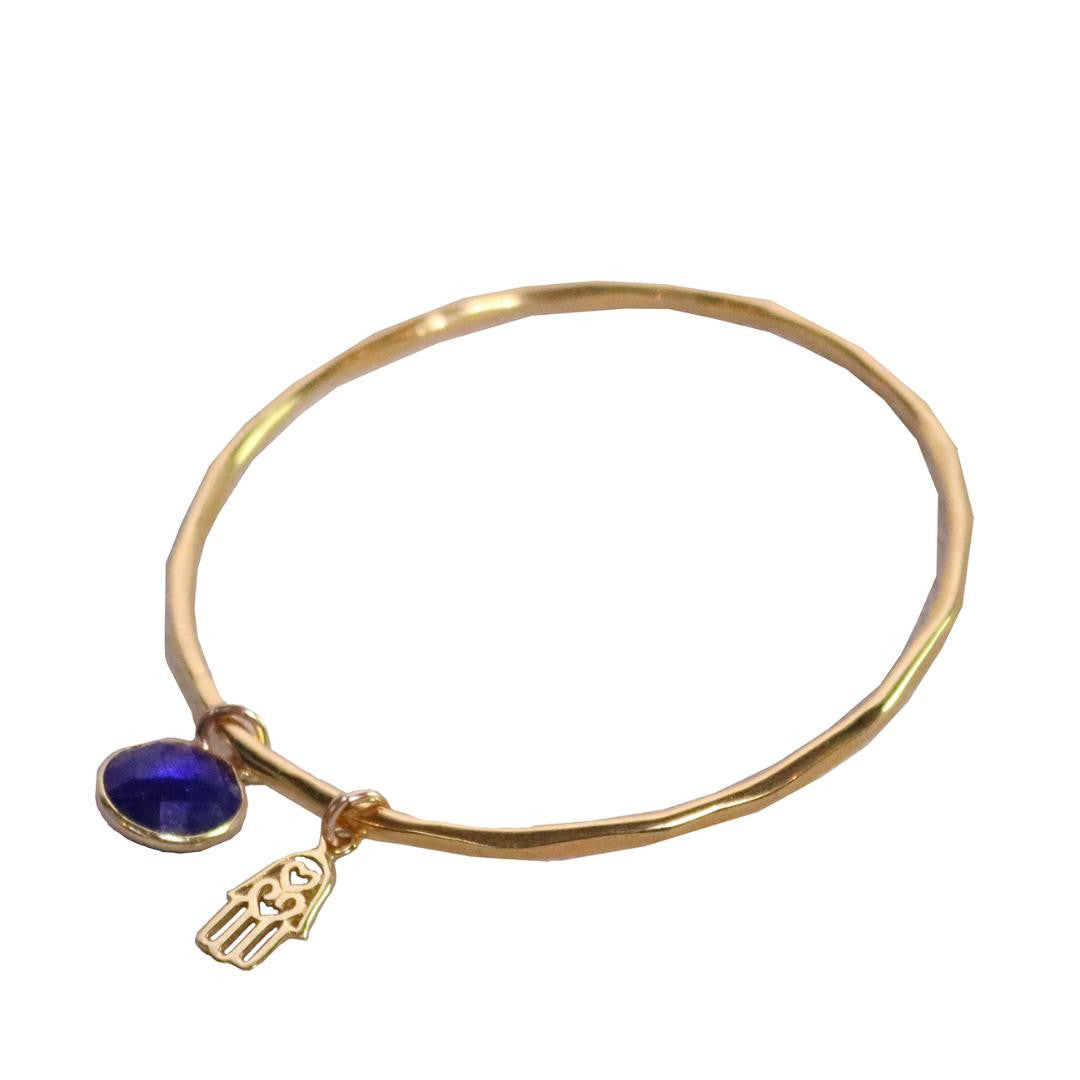 sapphire charm bangle with hamsa hands symbol in gold  