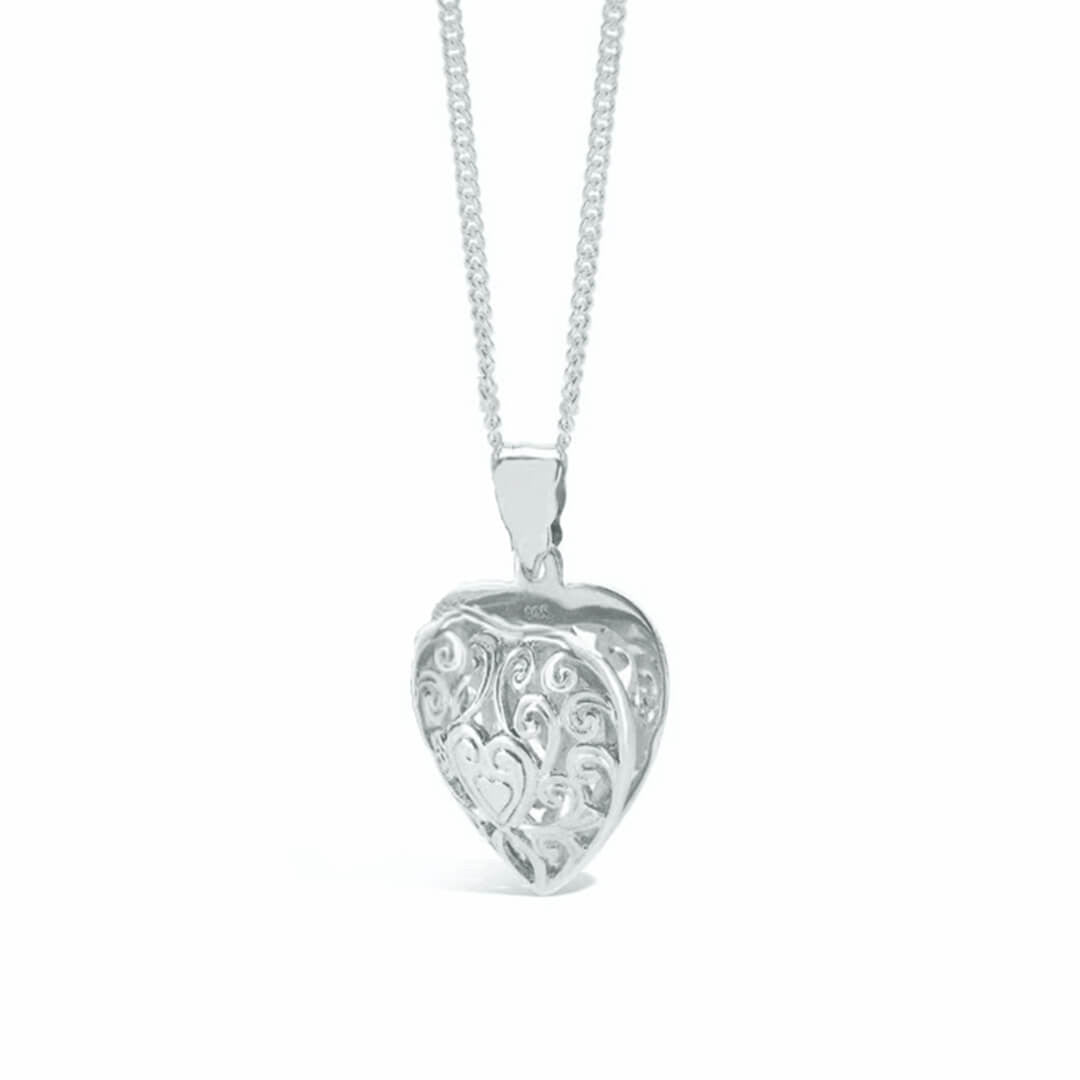 heart locket necklace in silver on a white background 