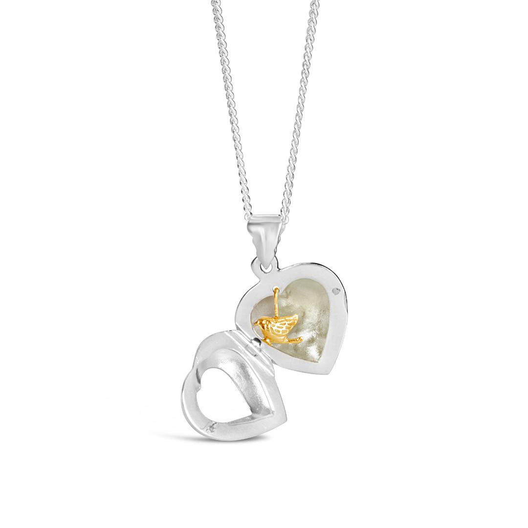 Lily Blanche sterling silver heart locket with gold bird inside open