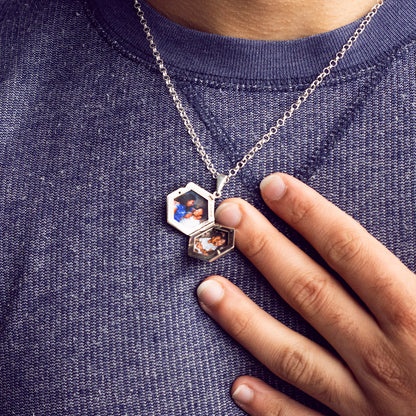 model wearing men's hexagon locket in white gold with photos inside