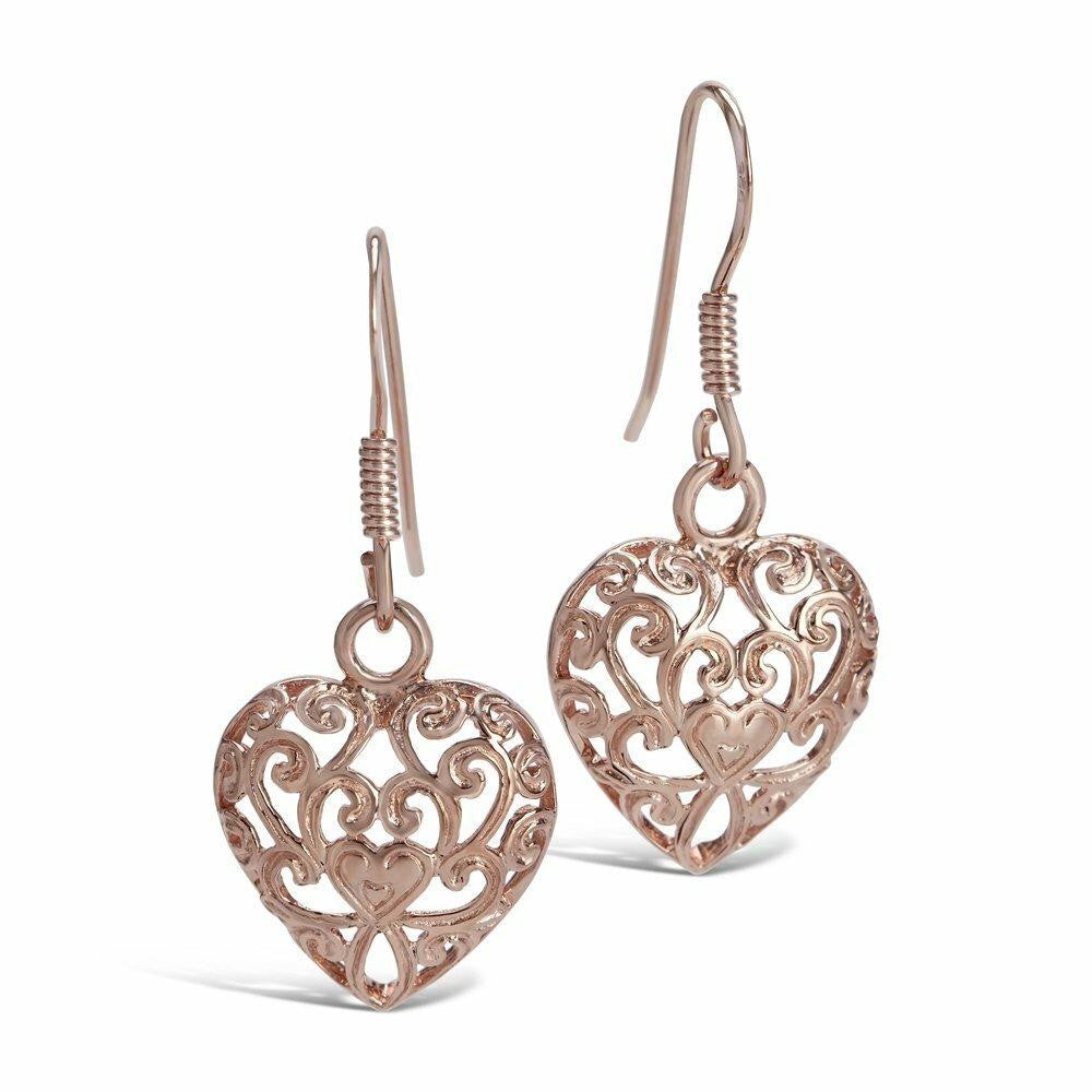 heart earrings in rose gold on a white background