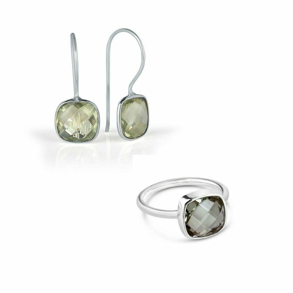 green amethyst earrings and cocktail ring in silver on a white background