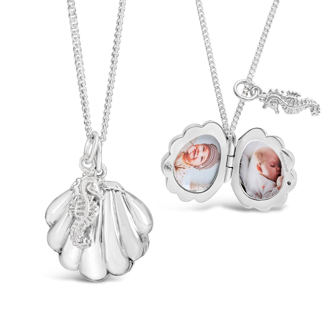 white gold shell locket with silver seahorse charm closed and locket open with 2 photos fitted inside