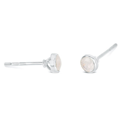 Silver moonstone stud earrings on a white background
