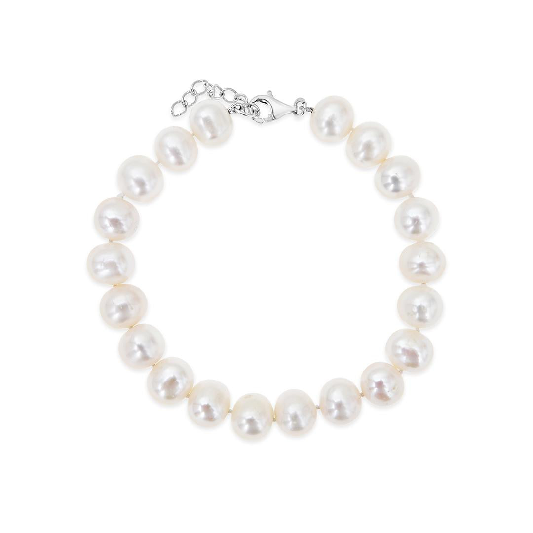 classic pearl bracelet in ivory on a white background