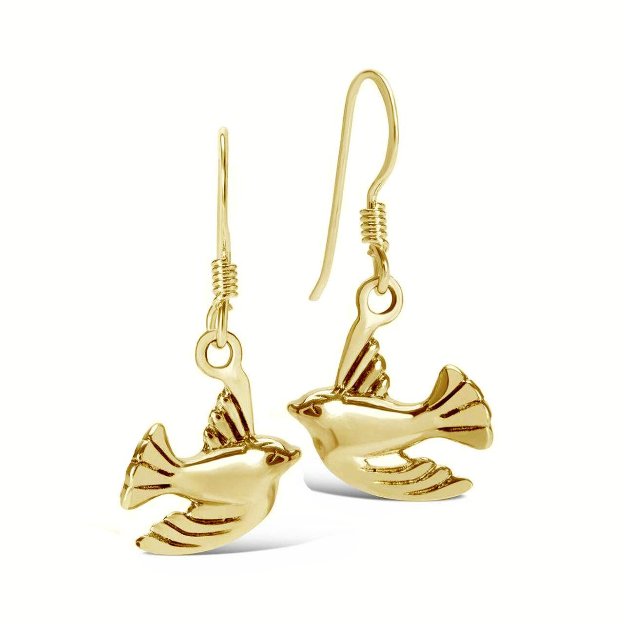 gold bird earrings on a white background