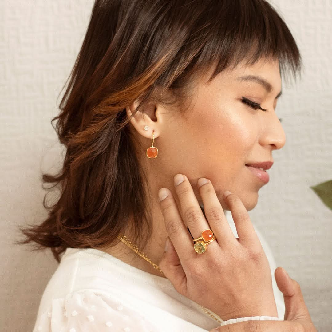 model wearing carnelian cocktail ring in gold 