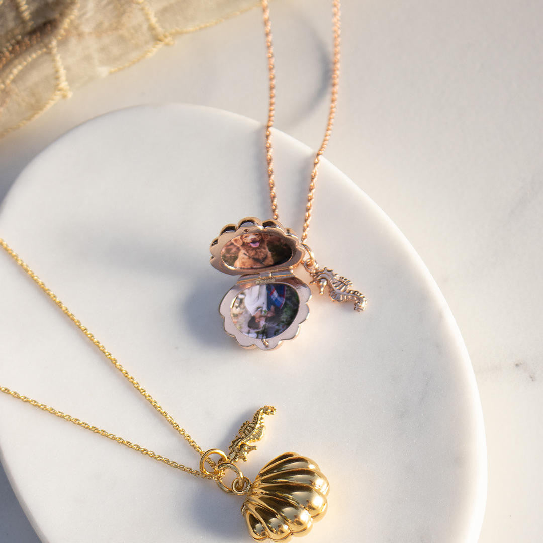 rose gold shell locket and gold shell locket with matching seahorse charms on chains