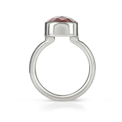 garnet cocktail ring in silver on a white background