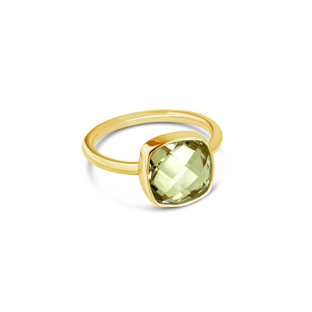 green amethyst cocktail ring on a white background