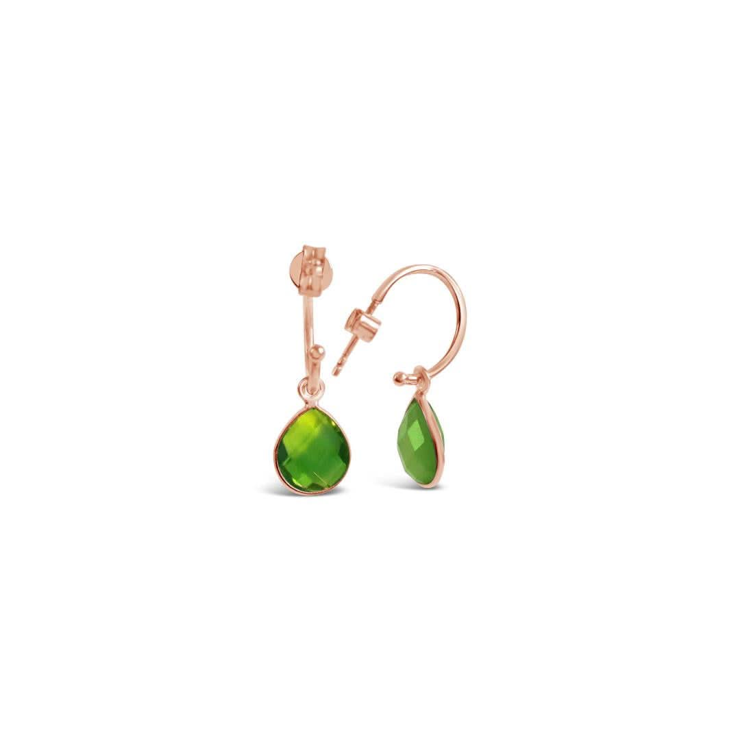 peridot drop hoop earrings in rose gold on a white background