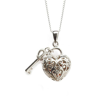 key to my heart pendant on a white background