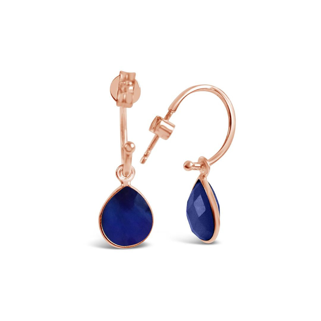 sapphire drop hoop earrings in rose gold on a white background