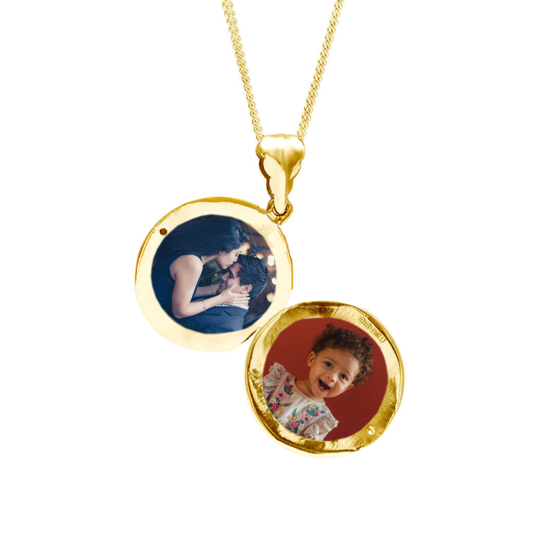 men's round locket necklace in gold on a white background