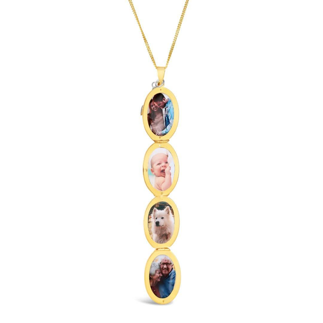 opened Family four photo oval locket on a white background