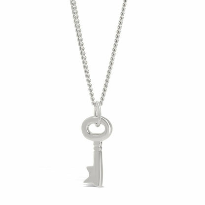 key pendant in silver on a white background