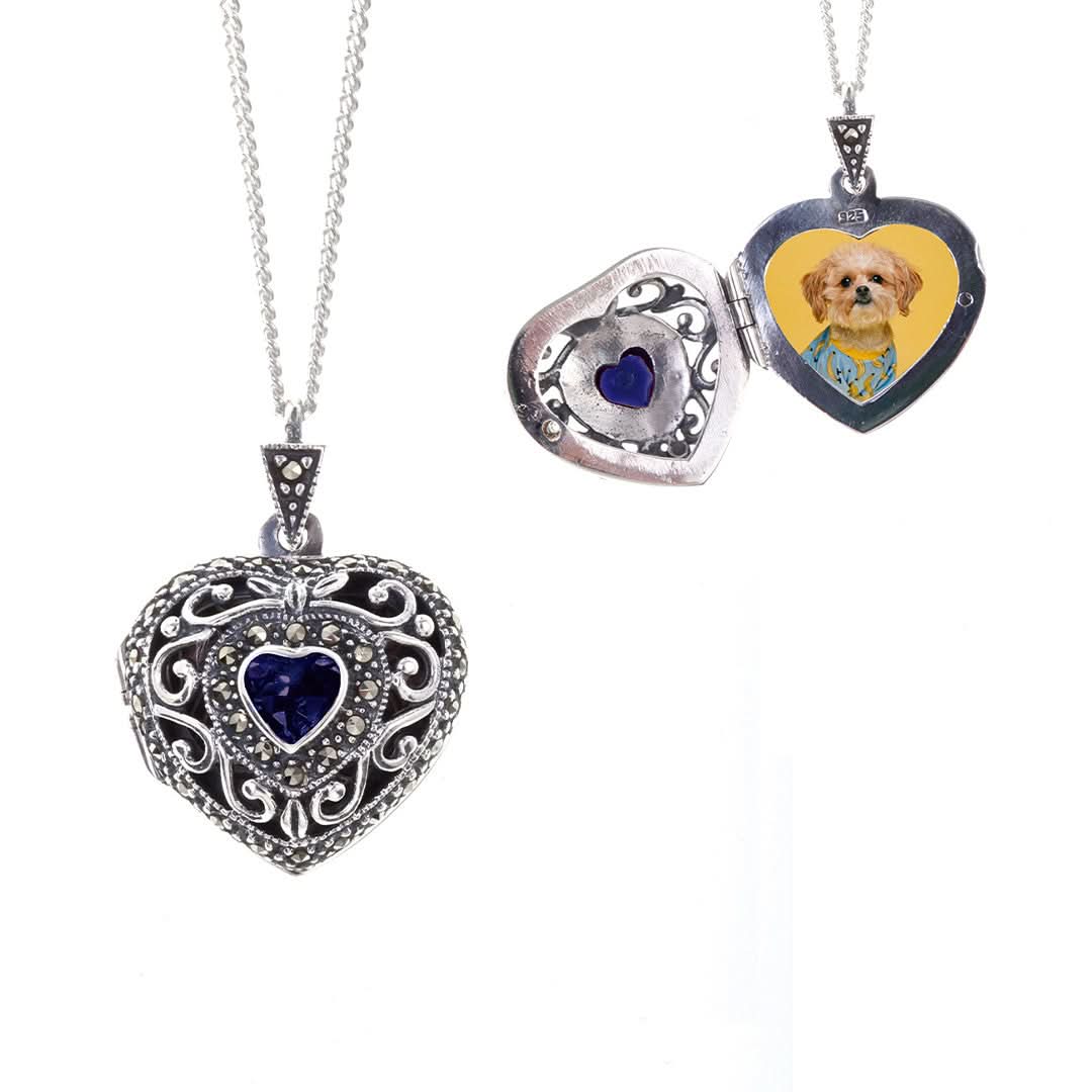 sapphire vintage heart locket in white gold with opened and closed view on a white background